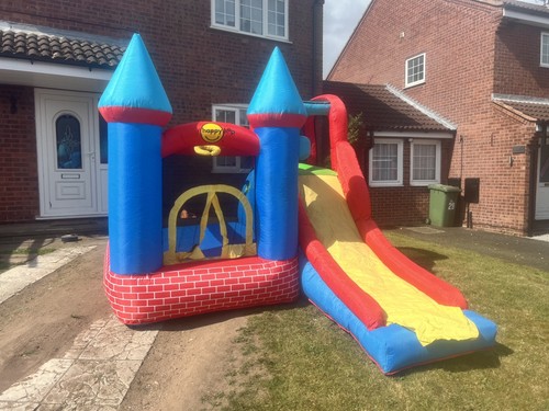 Bouncy castle and slide for
